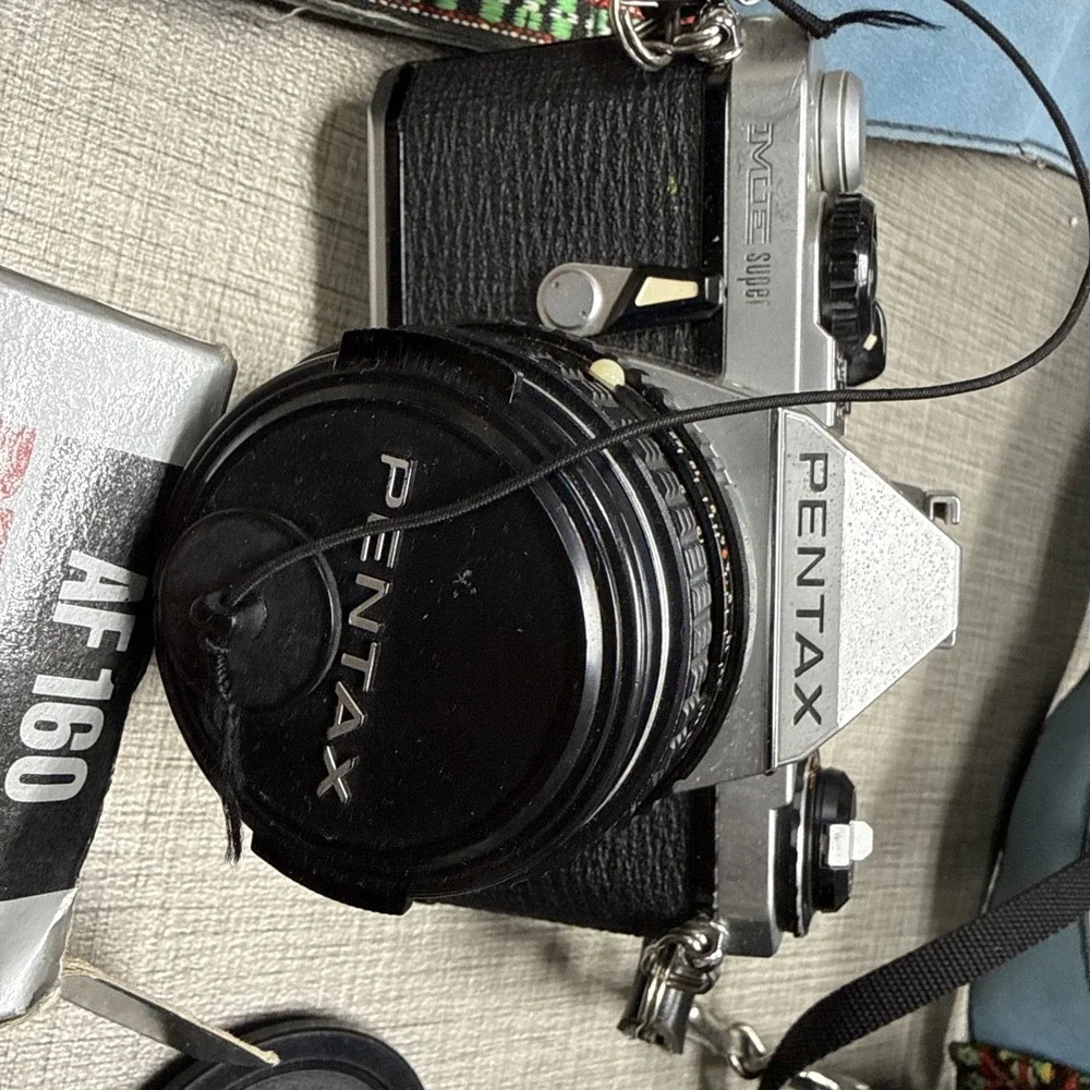 Pentax ME Super 35mm SLR Film Camera with 50 mm lens And Pentax Flash Extras Lot